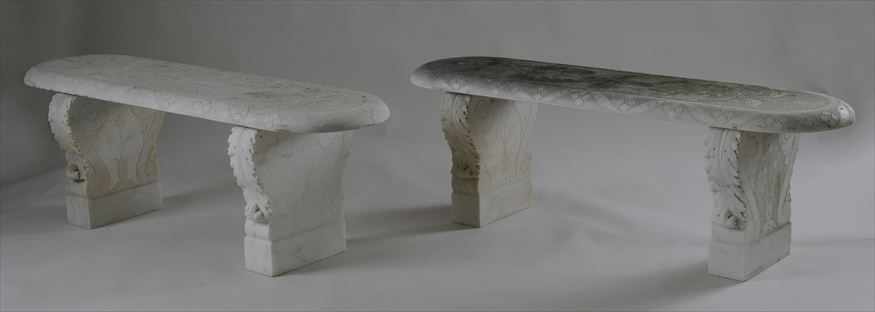 Appraisal: PAIR OF CARVED STONE GARDEN BENCHES Each seat with rounded