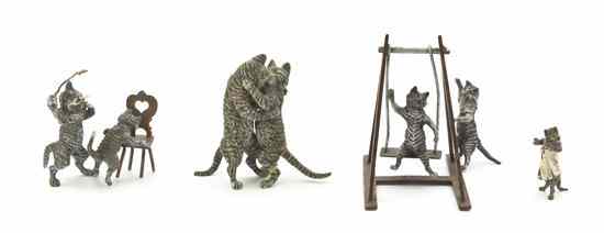 Appraisal: Three Austrian Cold Painted Bronze Animalier Groups comprising cats kissing