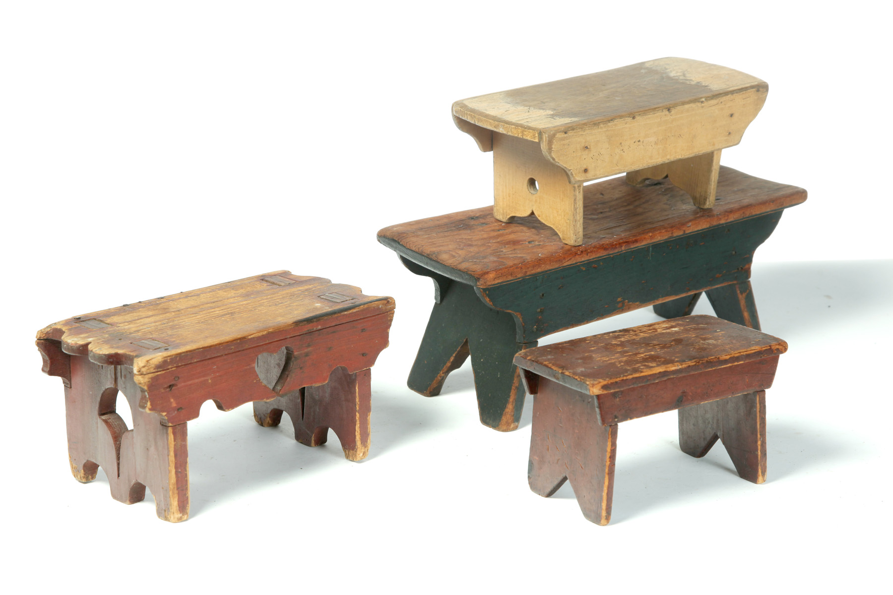 Appraisal: FOUR SMALL AMERICAN FOOTSTOOLS Nineteenth century mixed woods Original paint