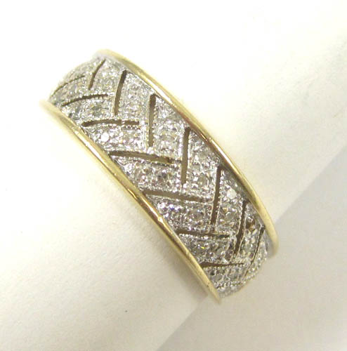 Appraisal: DIAMOND AND FOURTEEN KARAT GOLD RING set with round-cut diamonds