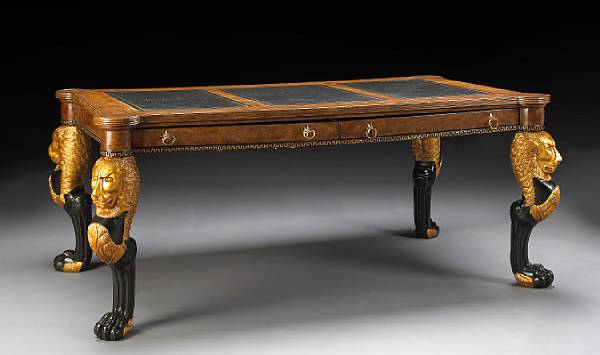 Appraisal: A George IV style parcel ebonized giltwood and mahogany desk