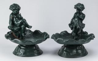 Appraisal: Figural putti cast iron birdbaths h Pair of figural putti