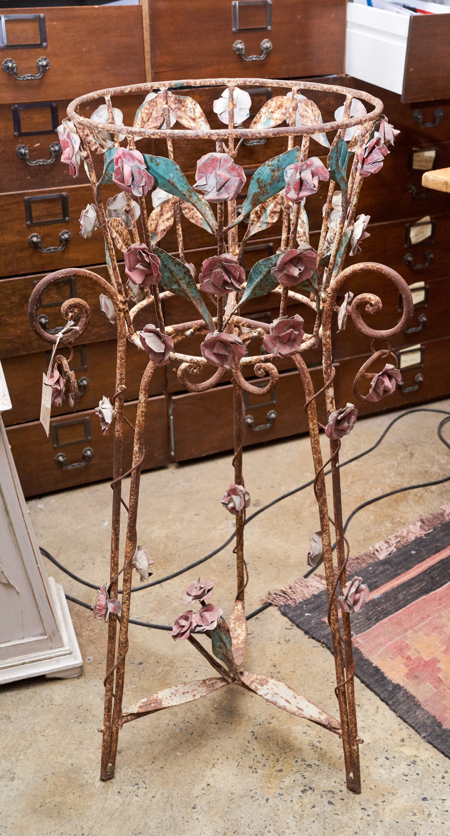 Appraisal: A DECORATIVE FRENCH FLOWER PLANTER Wrough iron with metal hand