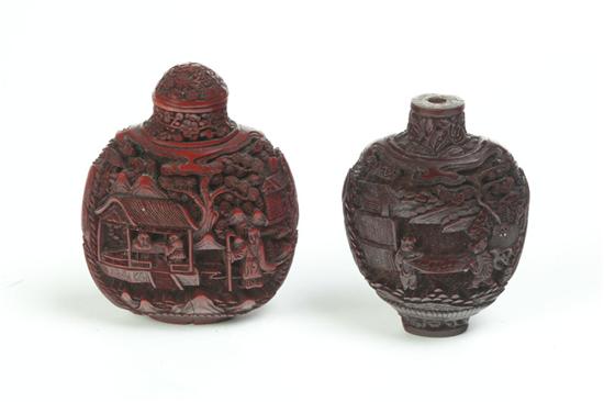 Appraisal: TWO SNUFF BOTTLES China th century cinnabar Dark red color