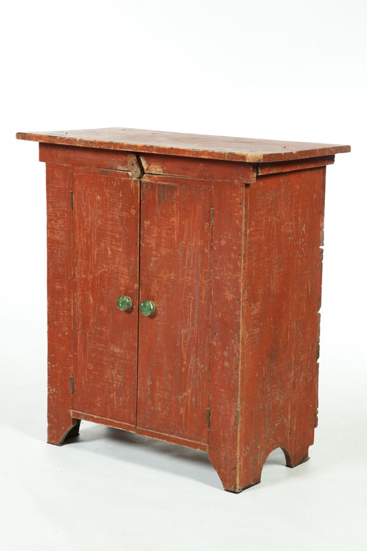 Appraisal: DIMINUTIVE CUPBOARD Attributed to Ohio th century pine Breadboard doors