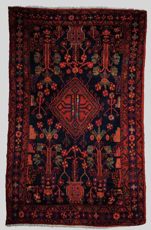 Appraisal: ORIENTAL HAMADAN RUG Deep blue field with flowers and urns