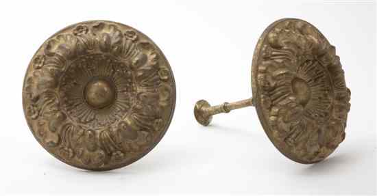 Appraisal: A Pair of Pressed Gilt Metal Curtain Tiebacks each of