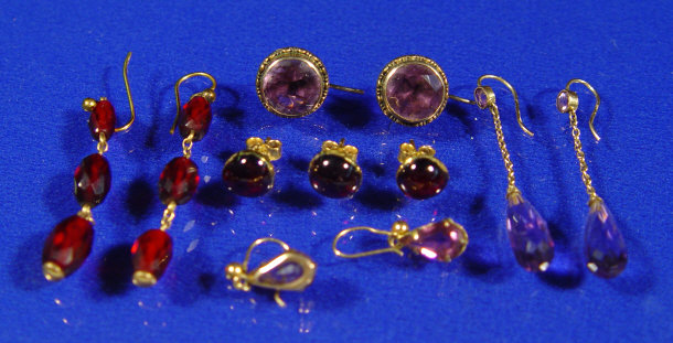 Appraisal: Three pairs of amethyst and gold earrings and two pairs