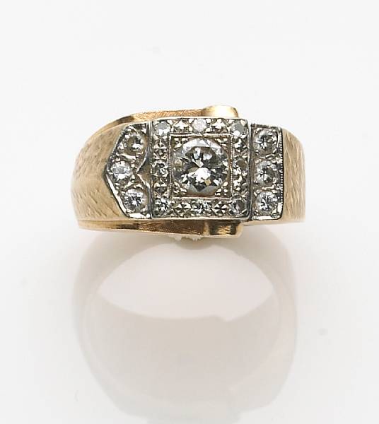 Appraisal: A diamond and k bicolor gold gent's ring center diamond