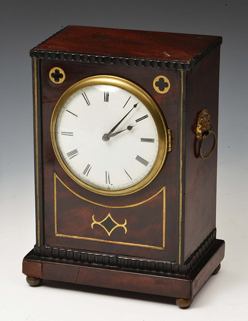 Appraisal: A REGENCY MAHOGANY TIMEPIECE CASE with brass inlay and standing