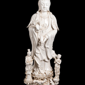 Appraisal: A Monumental Chinese Blanc-de-Chine Porcelain Guanyin Figural Group th Century