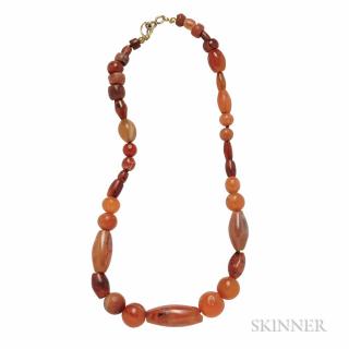 Appraisal: Four Ancient Bead Necklaces a Bactrian carnelian and banded agate