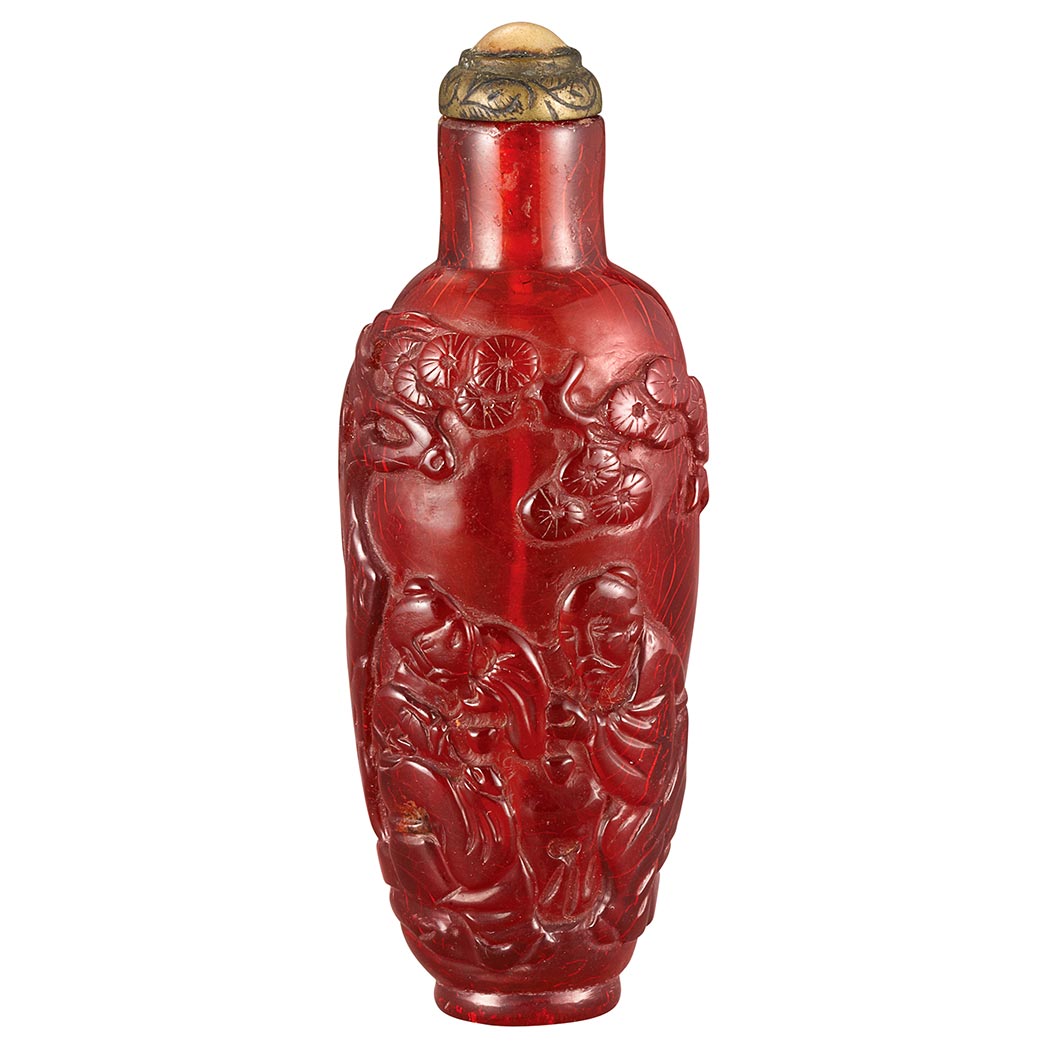 Appraisal: Chinese Amber Snuff Bottle th Century The slender tapered shape