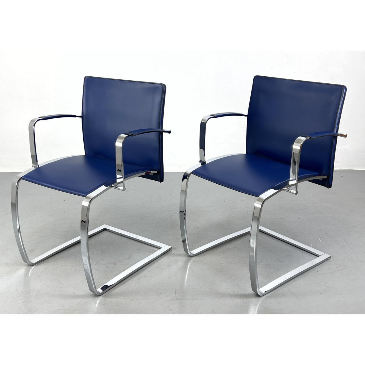 Appraisal: Pr ENRICO PELLIZZONI Cobalt Blue Leather Chairs Cantilever chromed steel