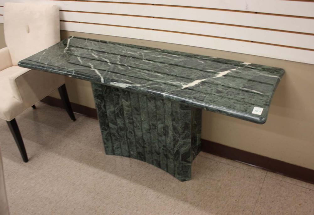 Appraisal: A CONTEMPORARY ITALIAN VERDE MARBLE PEDESTAL CONSOLE TABLE having a