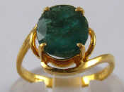 Appraisal: A yellow metal tests high carat gold emerald ring marked