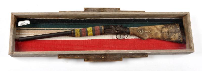 Appraisal: Indian-Western Shotgun Display The gun appears to be a generic