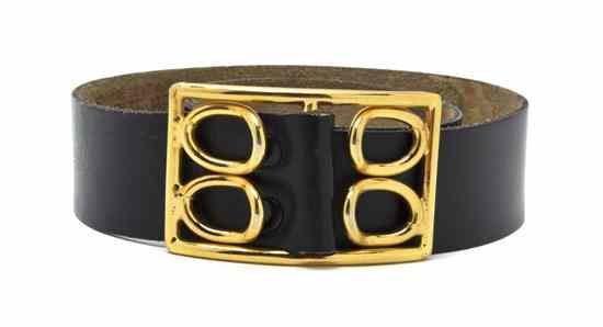 Appraisal: A Givenchy Black Leather Belt goldtone buckle adjustable length Stamped