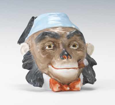 Appraisal: A Figural Cigar Smoking Monkey Humidor Hand colored porcelain tobacco