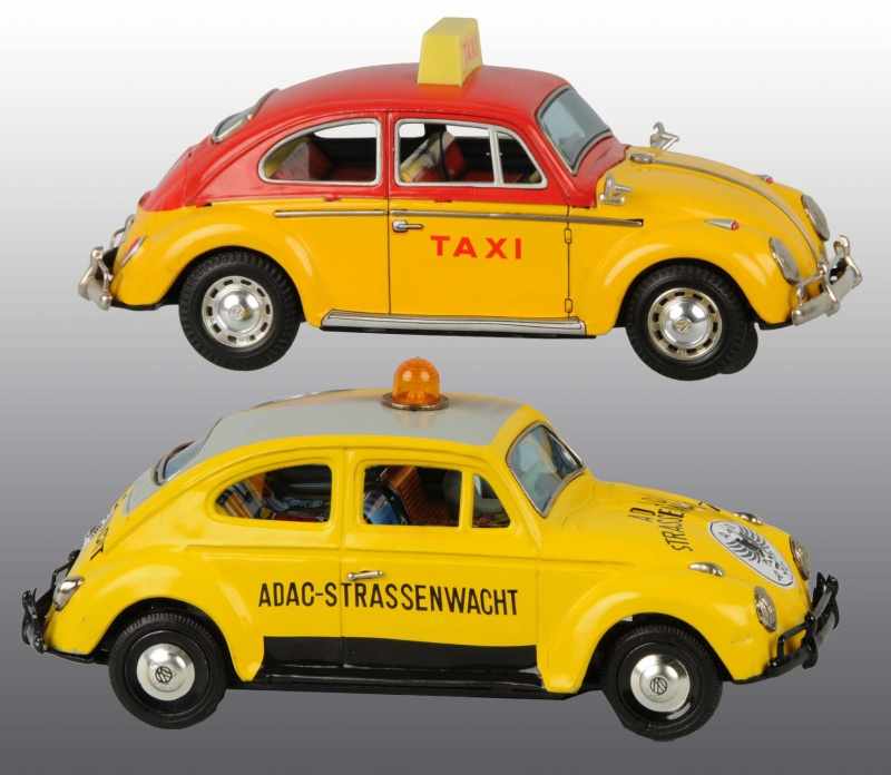 Appraisal: Lot of Tin Litho Volkswagen Battery-Op Toys Description Japanese Working