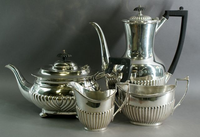 Appraisal: A silver plate tea set by Cooper four pieces