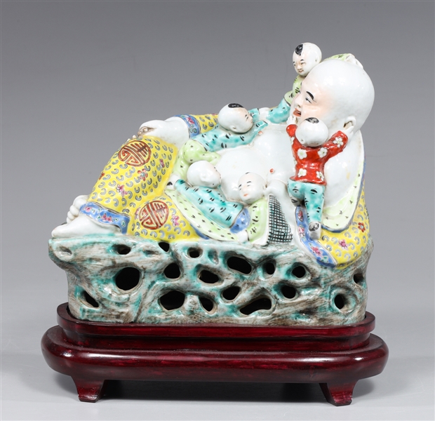 Appraisal: Antique Chinese porcelain reclining Buddhi with five children the Buddhi