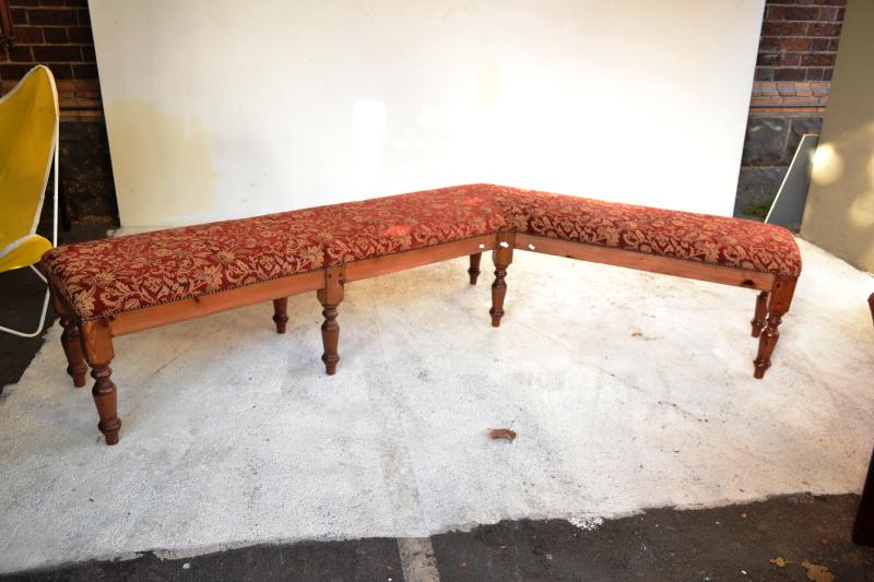 Appraisal: AN ANTIQUE STYLE ANGLED BENCH SEAT WITH CLASSICAL PATTERNED BURGUNDY