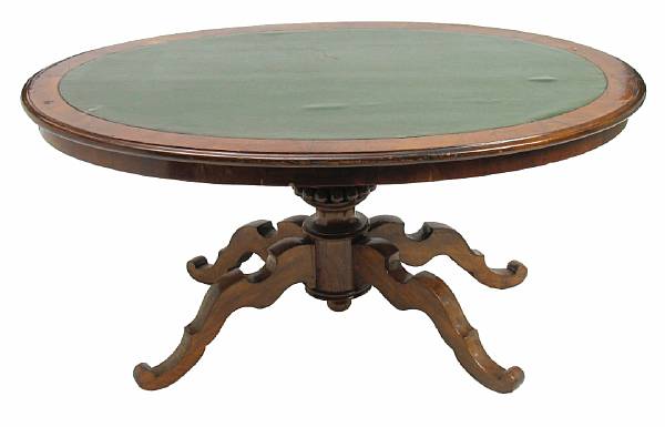 Appraisal: A Victorian mahogany and leather top center table reduced in