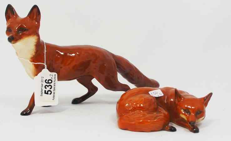 Appraisal: Beswick Fox Standing a and a Curled Fox