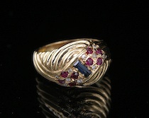 Appraisal: A Ladies' Gold Diamonds Ruby and a Sapphire Ring k