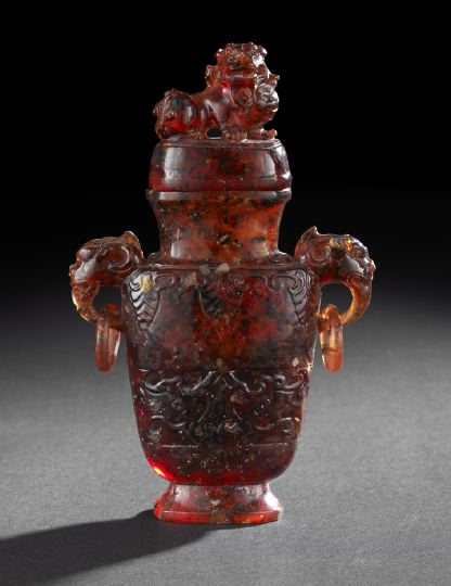 Appraisal: Chinese Carved Amber Covered Vase th century of flattened form