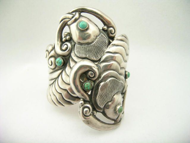 Appraisal: Taxco silver fish motif clamper cuff bracelet with turquoise eyes