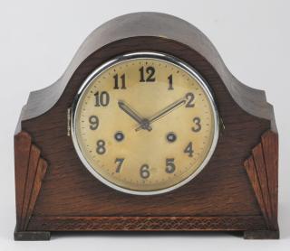 Appraisal: Art Deco inspired mantel clock Art Deco inspired carved wood