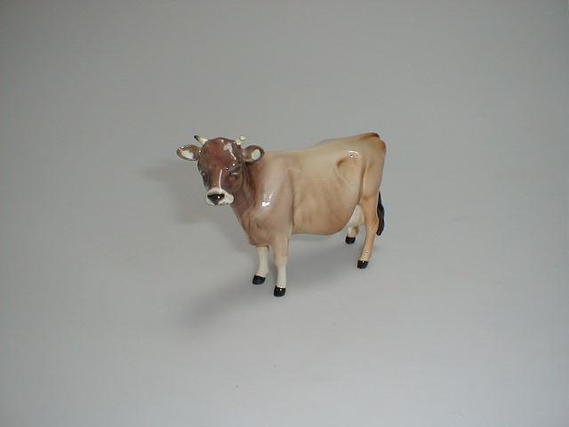 Appraisal: Beswick figures Friesian calf C broken ear together with Jersey