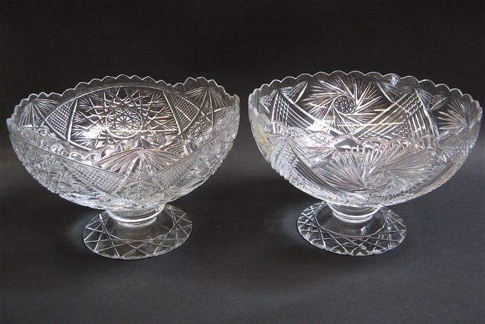 Appraisal: TWO HAND CUT AND ENGRAVED GLASS COMPOTES in complementary patterns