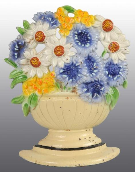 Appraisal: Cast Iron Daisy Bowl Doorstop Description Made by Hubley and