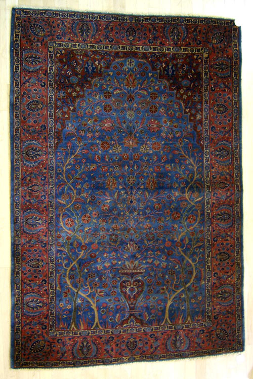 Appraisal: Kashan throw rug ca with floral decoration on a blue