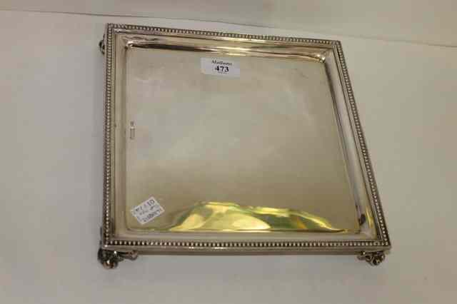 Appraisal: A SILVER TRAY of square cut form with raised bobbin