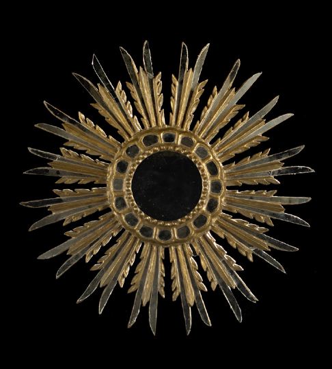 Appraisal: Italian Giltwood Sunburst Looking Glass mid- th century the circular