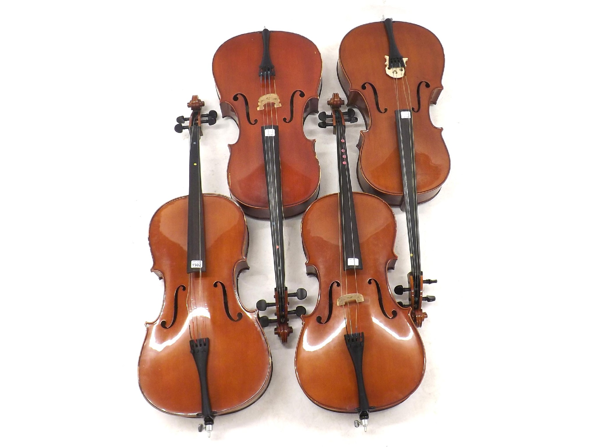 Appraisal: Four various contemporary small student violoncellos all at fault This