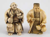 Appraisal: Two ivory netsuke circa one signed of a man with