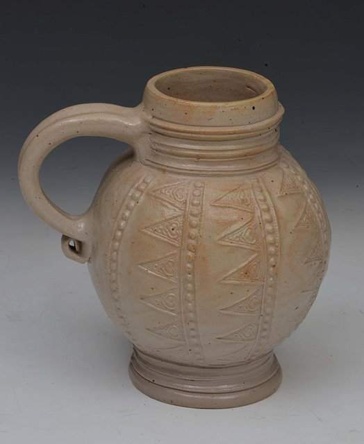 Appraisal: A WESTERWALD STONEWARE TANKARD with raised geometric decoration circa cm