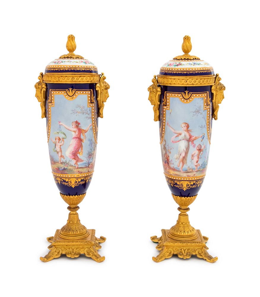 Appraisal: A Pair of Sevres Style Gilt Bronze Mounted Painted Parcel