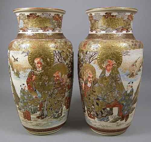 Appraisal: A pair of Japanese pottery ''Satsuma'' baluster shaped vases decorated