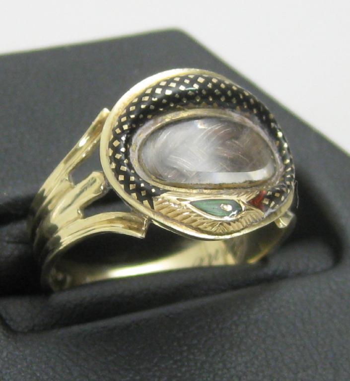 Appraisal: A Georgian Mourning Ring with lock of hair within enamel