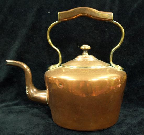 Appraisal: An oval copper kettle and cover cm high