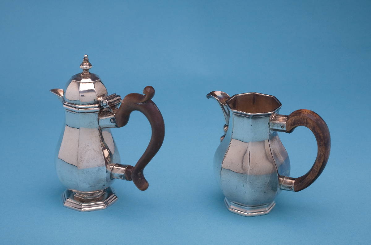 Appraisal: GEORGE III SILVER HOT MILK JUG AND COVER THOMAS DANIELL