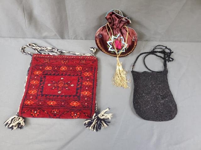 Appraisal: Group of vintage purses including and woven carpet bag from