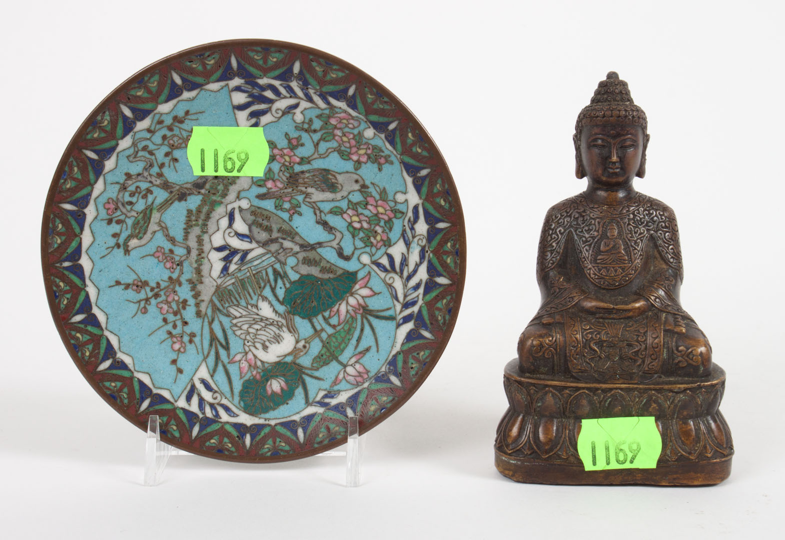 Appraisal: Chinese bronze Buddha and cloisonne plate seated Buddha signed in