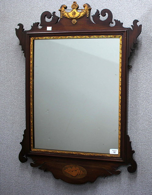 Appraisal: AN EDWARDIAN GEORGE III STYLE MAHOGANY FRET FRAMED WALL MIRROR